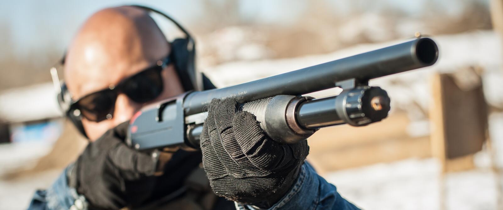 tactical-combat-pump-gun-shooting-training-shotgun-weapon-action-course-outdoor-range-143820903